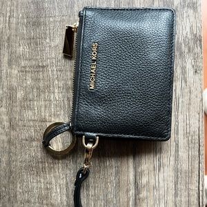 Black and gold Michael Kors wristlet/wallet